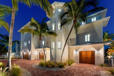 Experience the pinnacle of luxury waterfront living in this