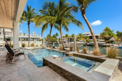 Experience the pinnacle of luxury waterfront living in this