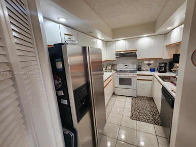 ENJOY RESORT STYLE LIVING IN CENTURY VILLAGE, ONE OF THE MOST