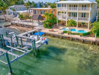 This custom-built three-bedroom, three-and-a-half-bath residence