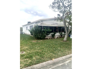 Vero Beach Home for Sale in a 55+ pet-friendly Community.  This