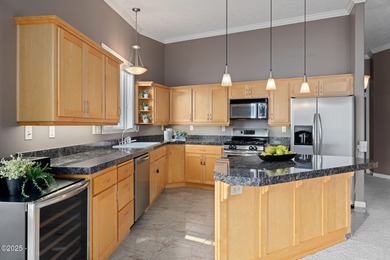 REMARKABLE AND RARE TOP FLOOR, CORNER UNIT, CONDO in the highly