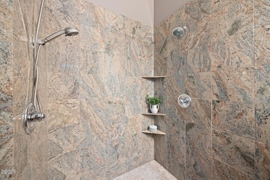 REMARKABLE AND RARE TOP FLOOR, CORNER UNIT, CONDO in the highly