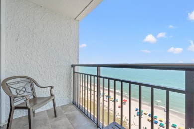 TOP FLOOR OCEANFRONT UNIT. Dive into modern elegance and comfort