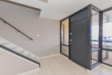 Location location!Beautiful remodeled  2 story penthouse with