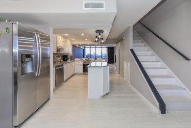 Location location!Beautiful remodeled  2 story penthouse with