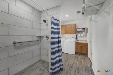 Nestled at the end of a quiet cul-de-sac, this 4-bedroom, 2-bath