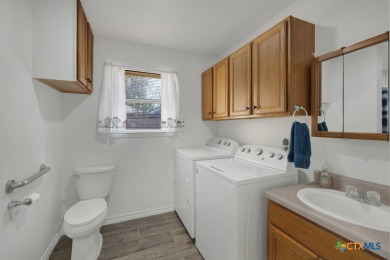 Nestled at the end of a quiet cul-de-sac, this 4-bedroom, 2-bath