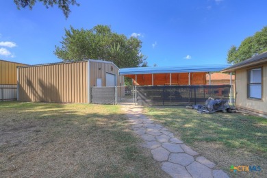 Nestled at the end of a quiet cul-de-sac, this 4-bedroom, 2-bath