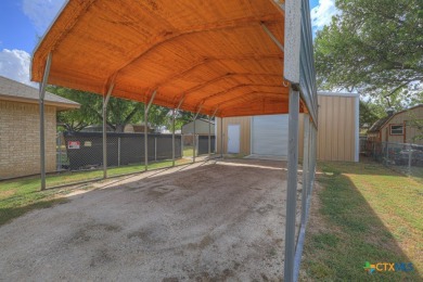 Nestled at the end of a quiet cul-de-sac, this 4-bedroom, 2-bath