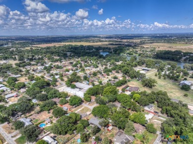 Nestled at the end of a quiet cul-de-sac, this 4-bedroom, 2-bath