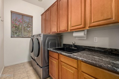 Elegant Gemini Twin in Prestigious Gated Community Near Golf