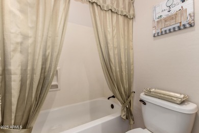 Elegant Gemini Twin in Prestigious Gated Community Near Golf