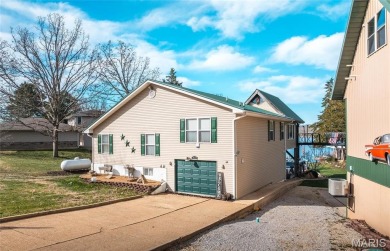 This stunning home located in Indian Hills Lake Community offers