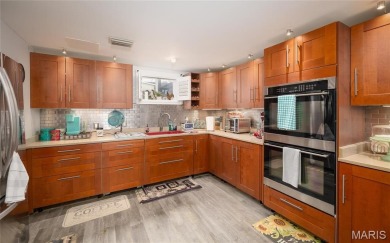 This stunning home located in Indian Hills Lake Community offers