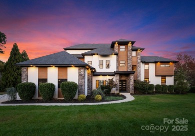 A one-of-a-kind modern masterpiece on Lake Norman. Crafted for
