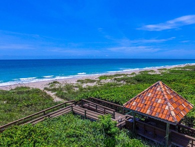 This exceptional oceanfront estate offers unparalleled privacy