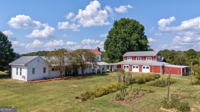 Nestled along the shores of Lake Oconee, this extraordinary