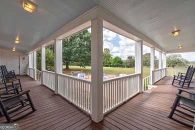 Nestled along the shores of Lake Oconee, this extraordinary