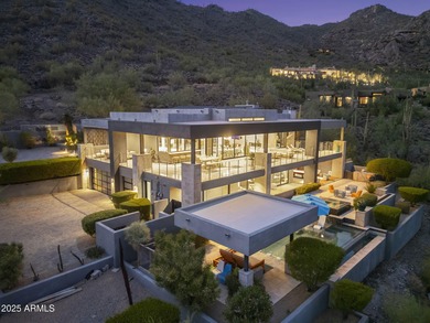 Perched on a private 2+ acre lot in Carefree, this architectural