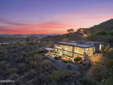 Perched on a private 2+ acre lot in Carefree, this architectural