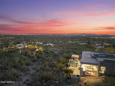 Perched on a private 2+ acre lot in Carefree, this architectural