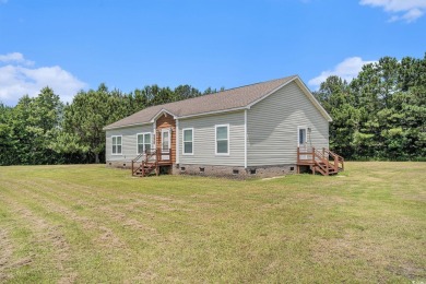 No HOA! This 3-bedroom, 2-bath home sits on over an acre of land