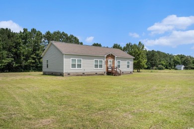 No HOA! This 3-bedroom, 2-bath home sits on over an acre of land