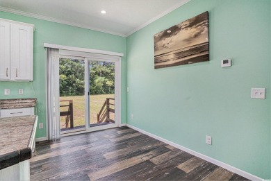 No HOA! This 3-bedroom, 2-bath home sits on over an acre of land