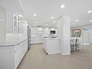 FULLY RENOVATED - Set high on the 10th floor with direct Gulf