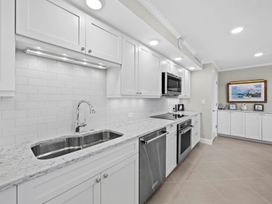 FULLY RENOVATED - Set high on the 10th floor with direct Gulf