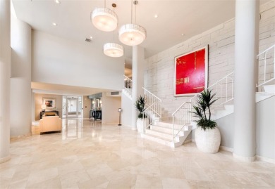 FULLY RENOVATED - Set high on the 10th floor with direct Gulf