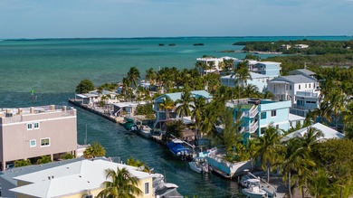 GOLDEN HOUR LIVING - This three level home offers four bedrooms