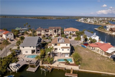 Discover the ultimate waterfront lifestyle in this stunning