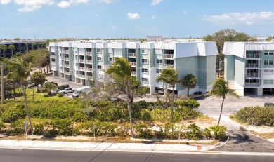 Enjoy the Key West lifestyle in this 2 bed, 2 bath end unit at