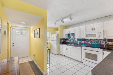 Enjoy the Key West lifestyle in this 2 bed, 2 bath end unit at