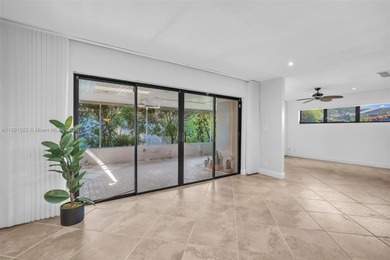 Corner one-level townhome in the sought-after Emerald Hills