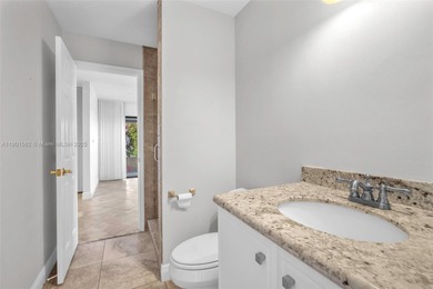 Corner one-level townhome in the sought-after Emerald Hills