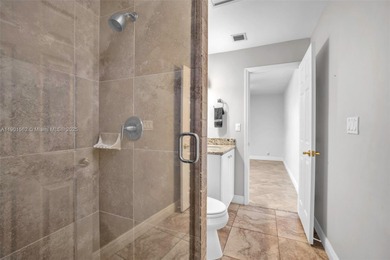 Corner one-level townhome in the sought-after Emerald Hills