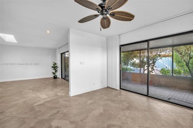 Corner one-level townhome in the sought-after Emerald Hills