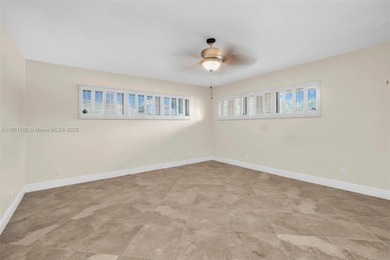 Corner one-level townhome in the sought-after Emerald Hills