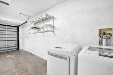 Corner one-level townhome in the sought-after Emerald Hills