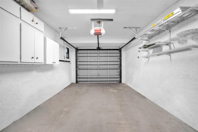 Corner one-level townhome in the sought-after Emerald Hills