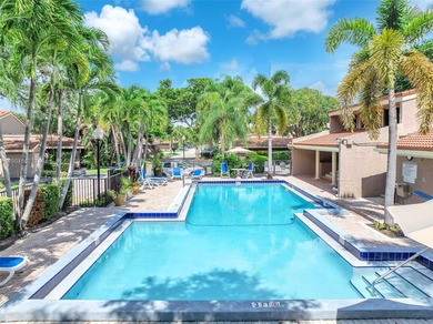 Corner one-level townhome in the sought-after Emerald Hills