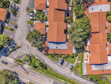 Corner one-level townhome in the sought-after Emerald Hills