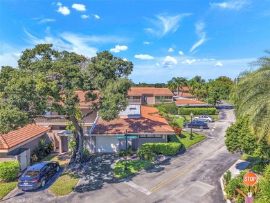 Corner one-level townhome in the sought-after Emerald Hills