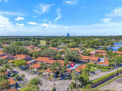 Corner one-level townhome in the sought-after Emerald Hills