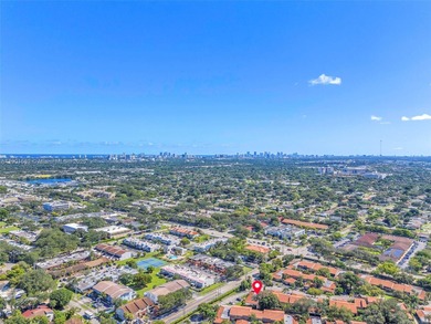 Corner one-level townhome in the sought-after Emerald Hills