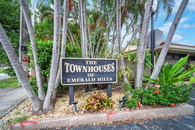 Corner one-level townhome in the sought-after Emerald Hills