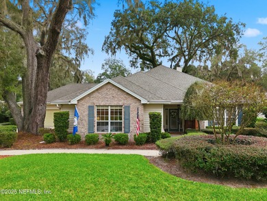 Nestled beneath a canopy of Mandarin oak trees, this